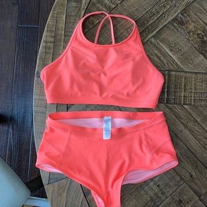 2 pc like new neon pinkish/orange ivivva swimsuit.